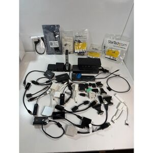 Large Set of Docking Stations, Cables, and Adapters